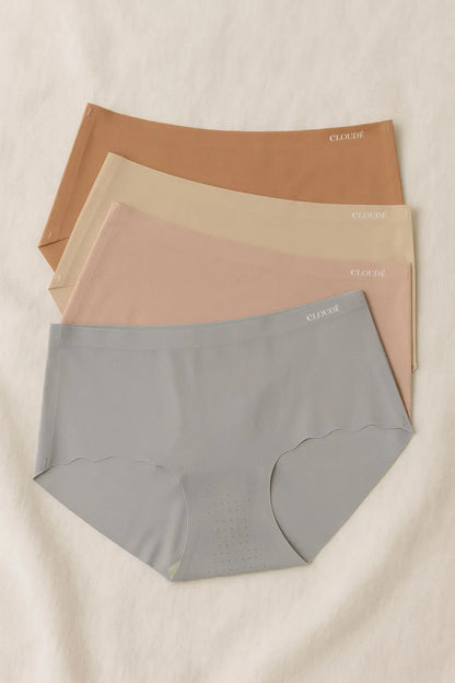 Flat lay of Muted Muse seamless women’s underwear set in gray, beige, nude pink, and peach, made from breathable nylon with mugwort-infused modal lining for all-day comfort.